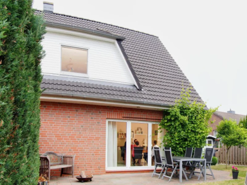 Terrace side of the semi-detached house in Rümpel