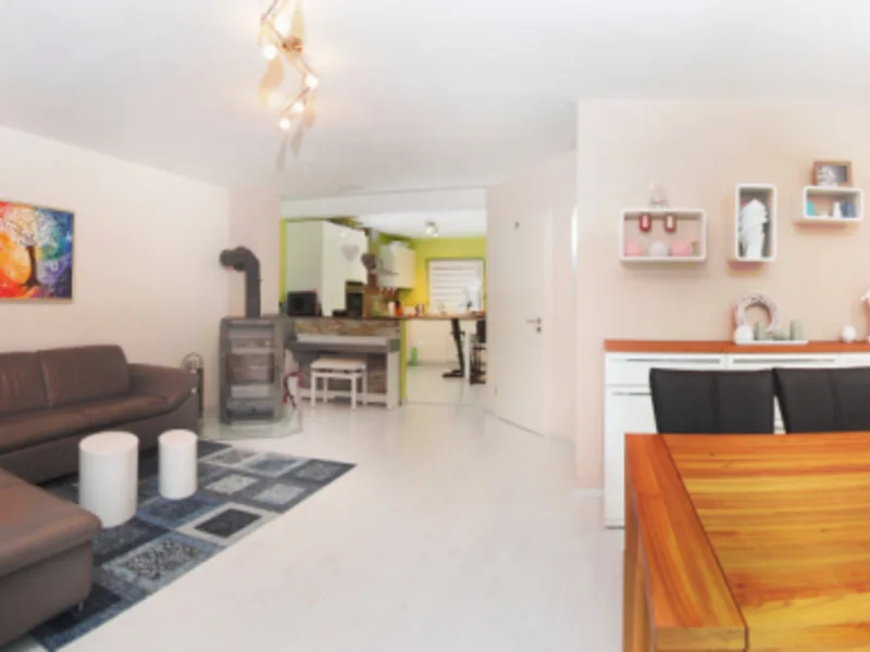Living and dining area of the semi-detached house in Rümpel
